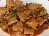 Mezzi paccheri con polipetti alla luciana