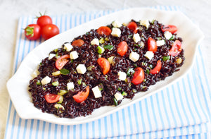 Riso venere pomodorini, feta e mais