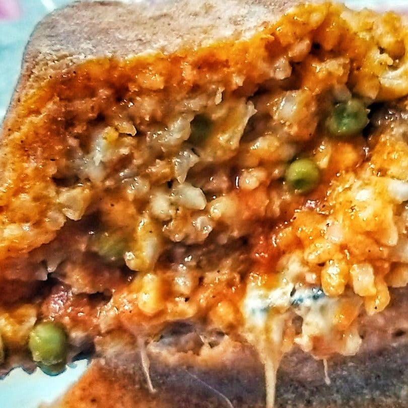 Sartù di riso alla bolognese rossa con piselli carne macinata  è mozzarella