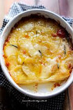 Parmigiana di patate con carne tritata e provola