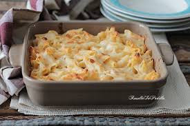 Rigatoni al forno con besciamella, cotto e provola