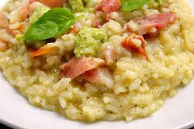 Risotto con crema di zucchine, spek e fontina