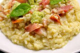 Risotto con crema di zucchine, spek e fontina