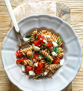Pasta pomodorini fesa e rucola