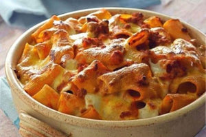 Timballo di pasta con melanzane, provola al forno