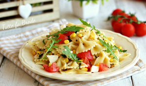 Farfalle fredde con cotto pomodorini e rucola