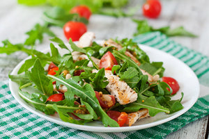 Tagliata di pollo con rucola e pomodorini